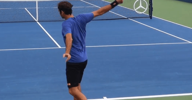 Federer practising with his old racquet at the US Open