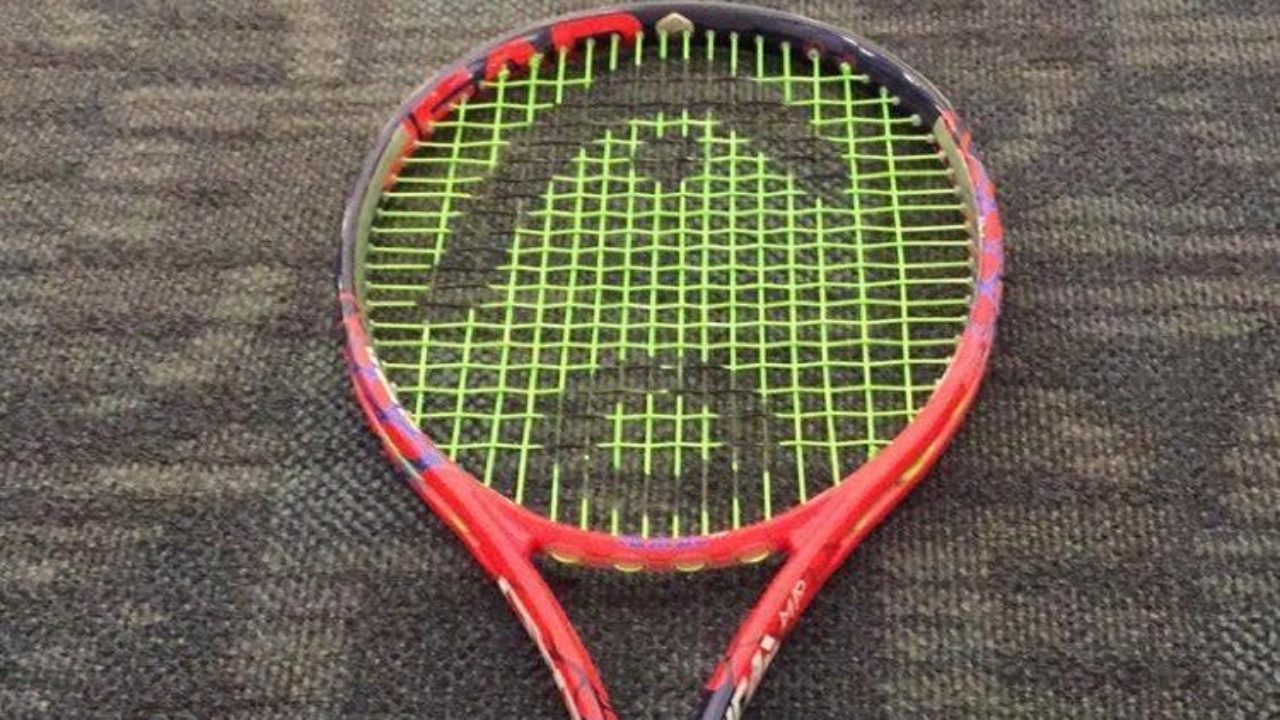 Orange HEAD Graphene Touch Radical MP Tennis Racquet Unstrung 