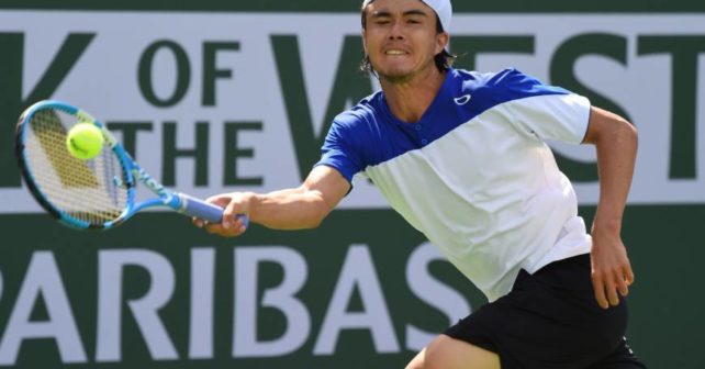 Taro Daniel's tennis racquet