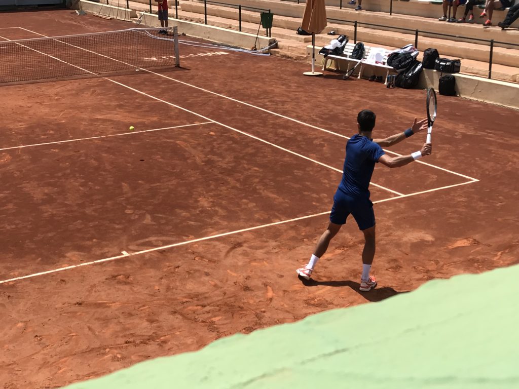 Watching Novak Djokovic Practice