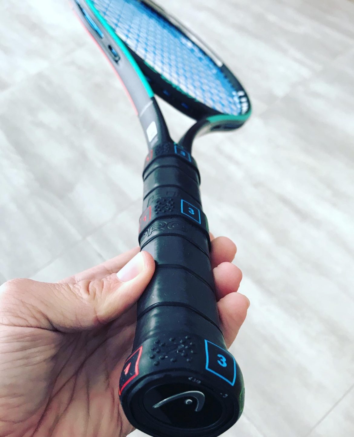 how to put on head tennis grip